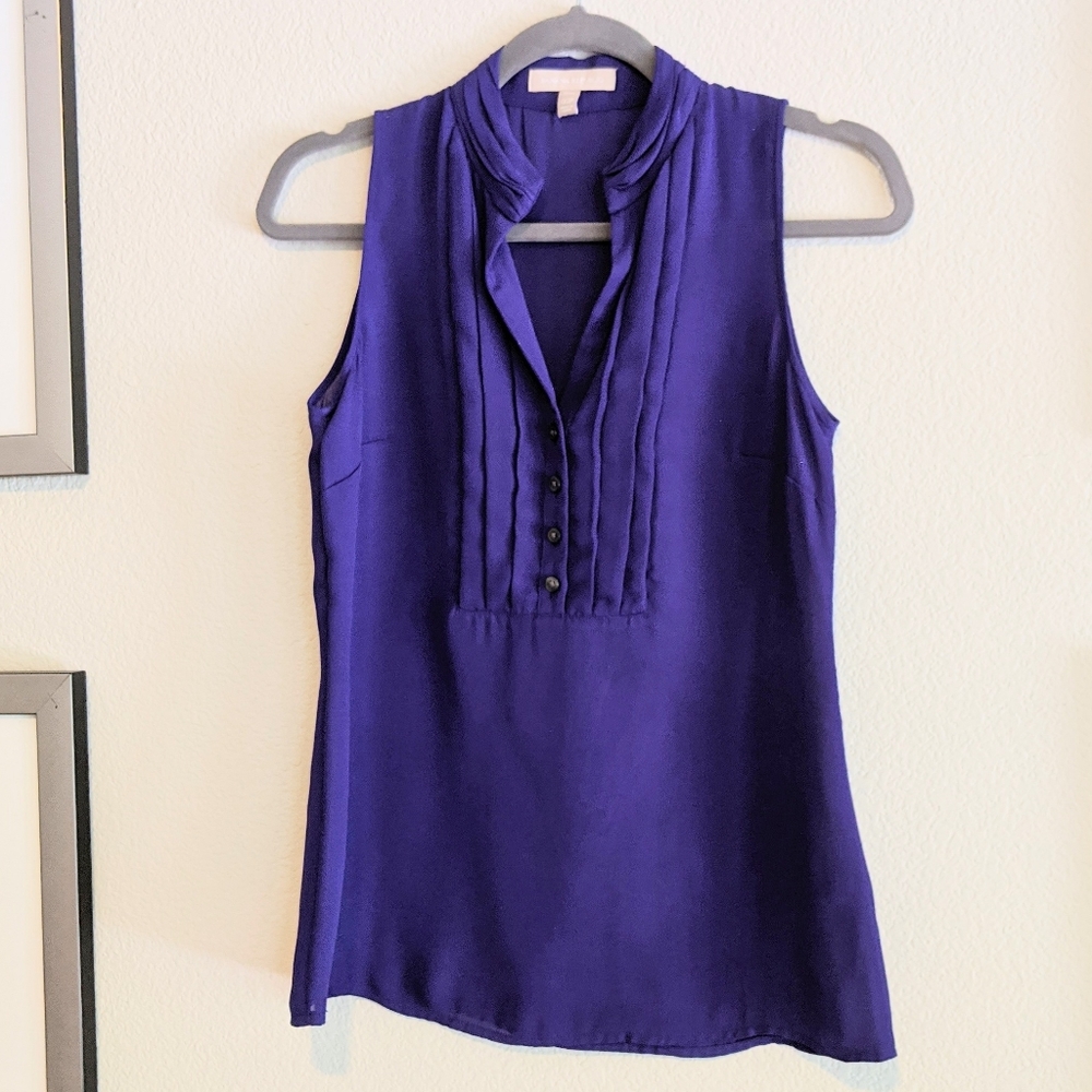 Purple sleeveless blouse